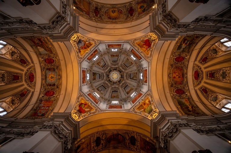 Ornate baroque cathedral interior with golden frescoes