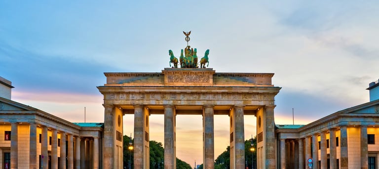 Brandenburg Gate illuminated at sunset, Berlin, Germany